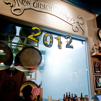 Window To Russian River Brewing Beer Barrels